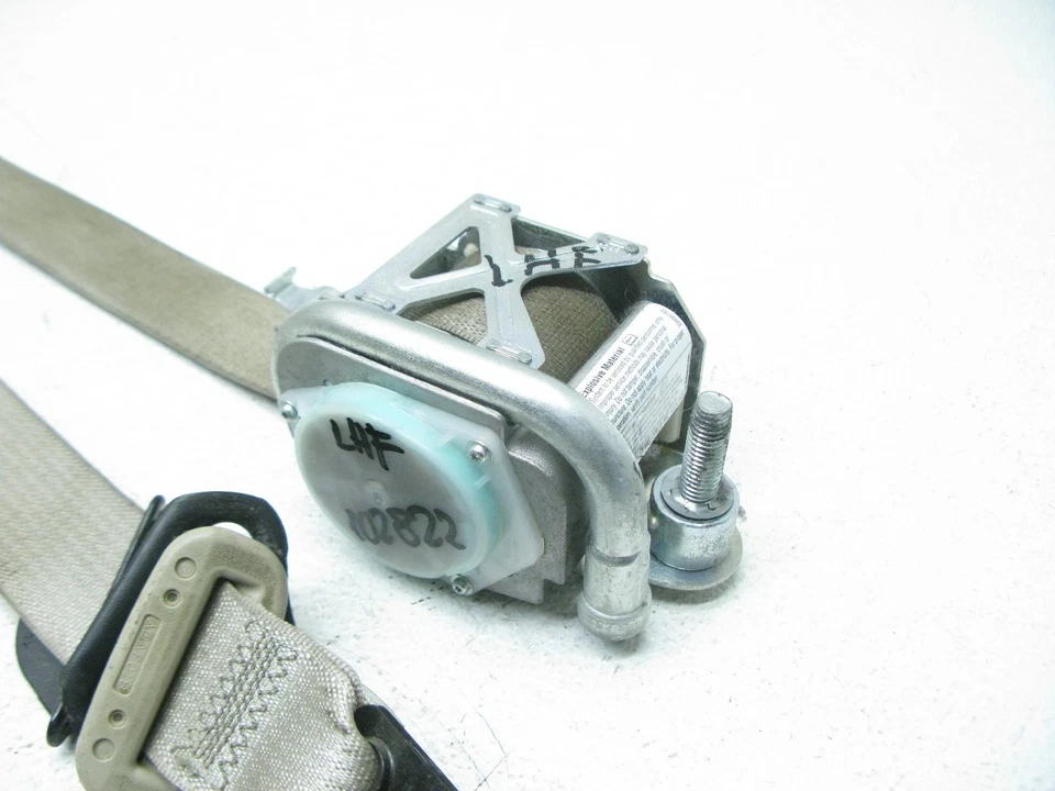 Cadillac DTS 2008-2011 retractor de cinturón de seguridad delantero izquierdo bronceado OEM Foto 2 de 4