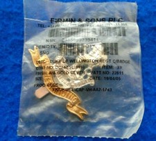 NEW IN THE BAG, DUKE OF WELLINGTONS WEST RIDING REGIMENT CAP BADGE. FIRMIN