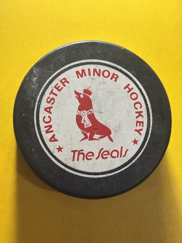 OLD VINTAGE HOCKEY PUCK - ANCASTER MINOR HOCKEY - THE SEALS