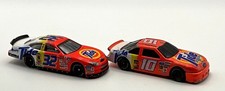 2 NASCAR Tide Race Cars Ricky Rudd Ford  10 32 played with condition