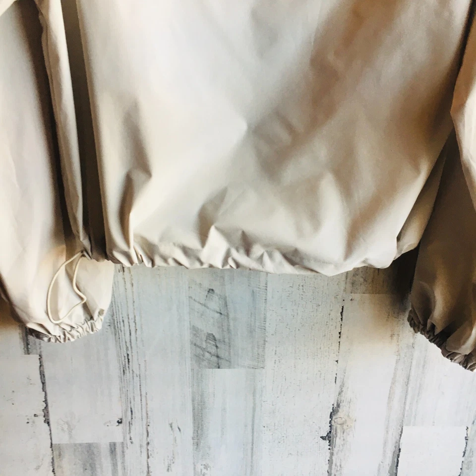 NUEVO SIN ETIQUETAS $158 Vimmia Paracaídas Top Beige M Rompevientos Pullover Cordón REVOLVE Foto 2 de 4