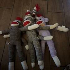 One Lot Of 4 Sock Monkeys by Schylling