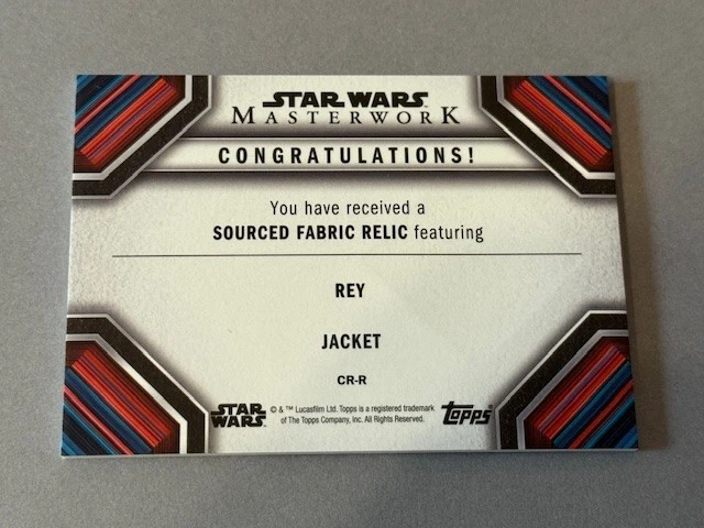 Chaqueta Rey Tela Usada Usada Reliquia Utilería Star Wars Topps Obra Maestra Daisy Ridley Foto 3 de 3