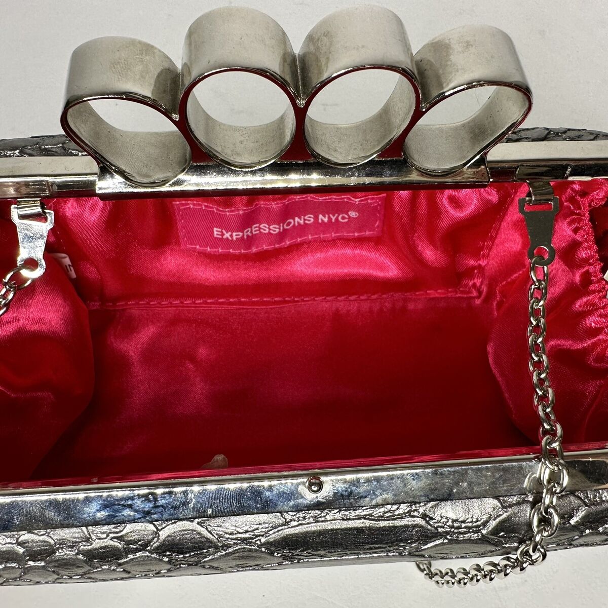 EXPRESSION NYC. silver clutch 7.5wide, 4inch tall, 3inch EXPRESSION NYC. silver clutch 7.5wide, 4inch tall, 3inch