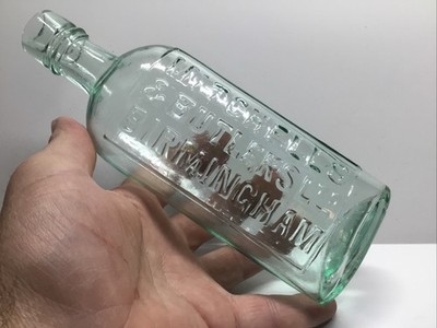 Antique Mitchell s & Butlers Applied Lip Medicinal Style Liquor Flask.