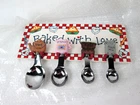 BAKED WITH LOVE Hanging Wall Plaque with 4 Measuring Spoons