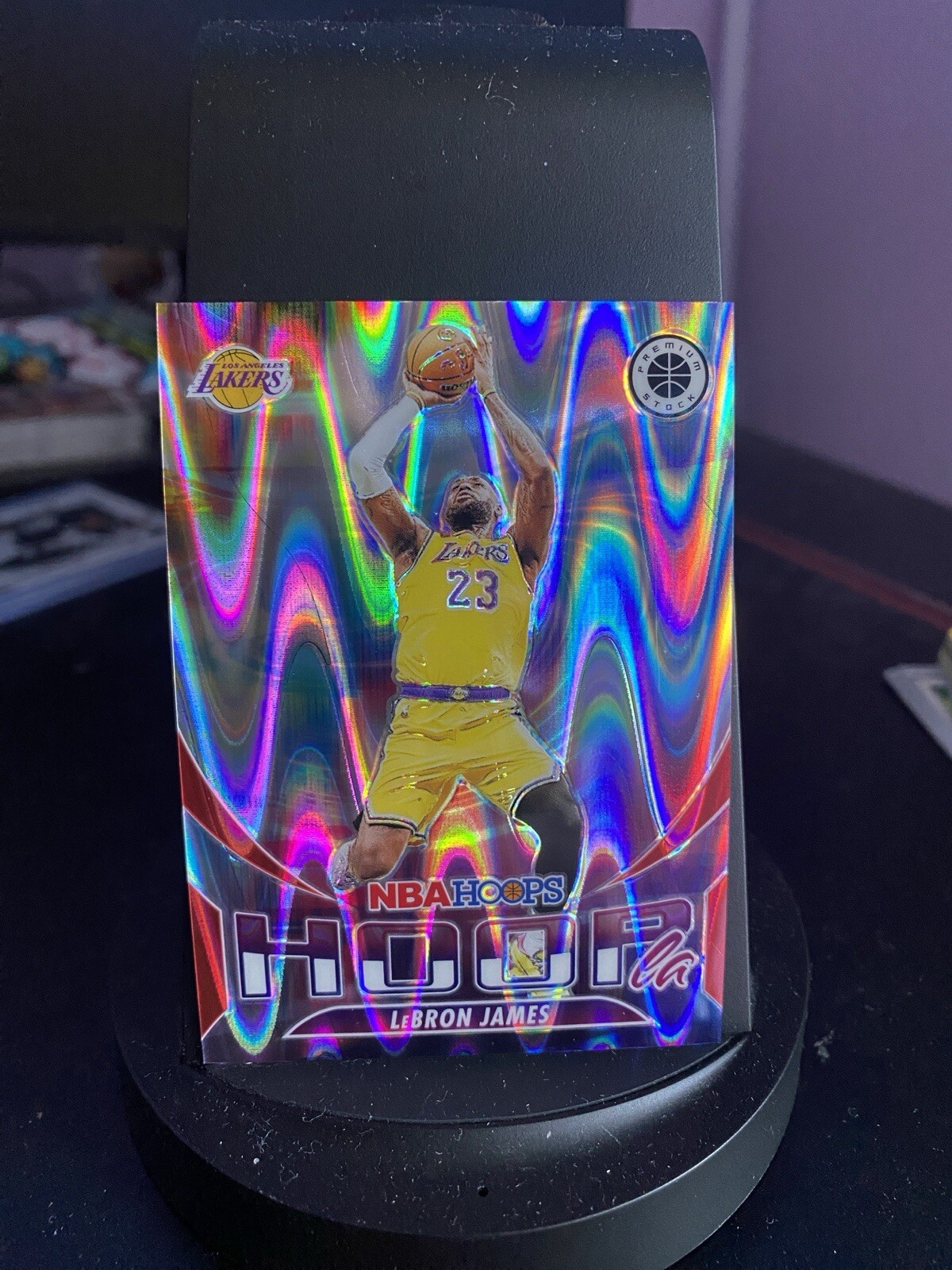 2023-24 NBA Hoops Premium Stock Hoopla LeBron James #10 Red Seismic #'d /199