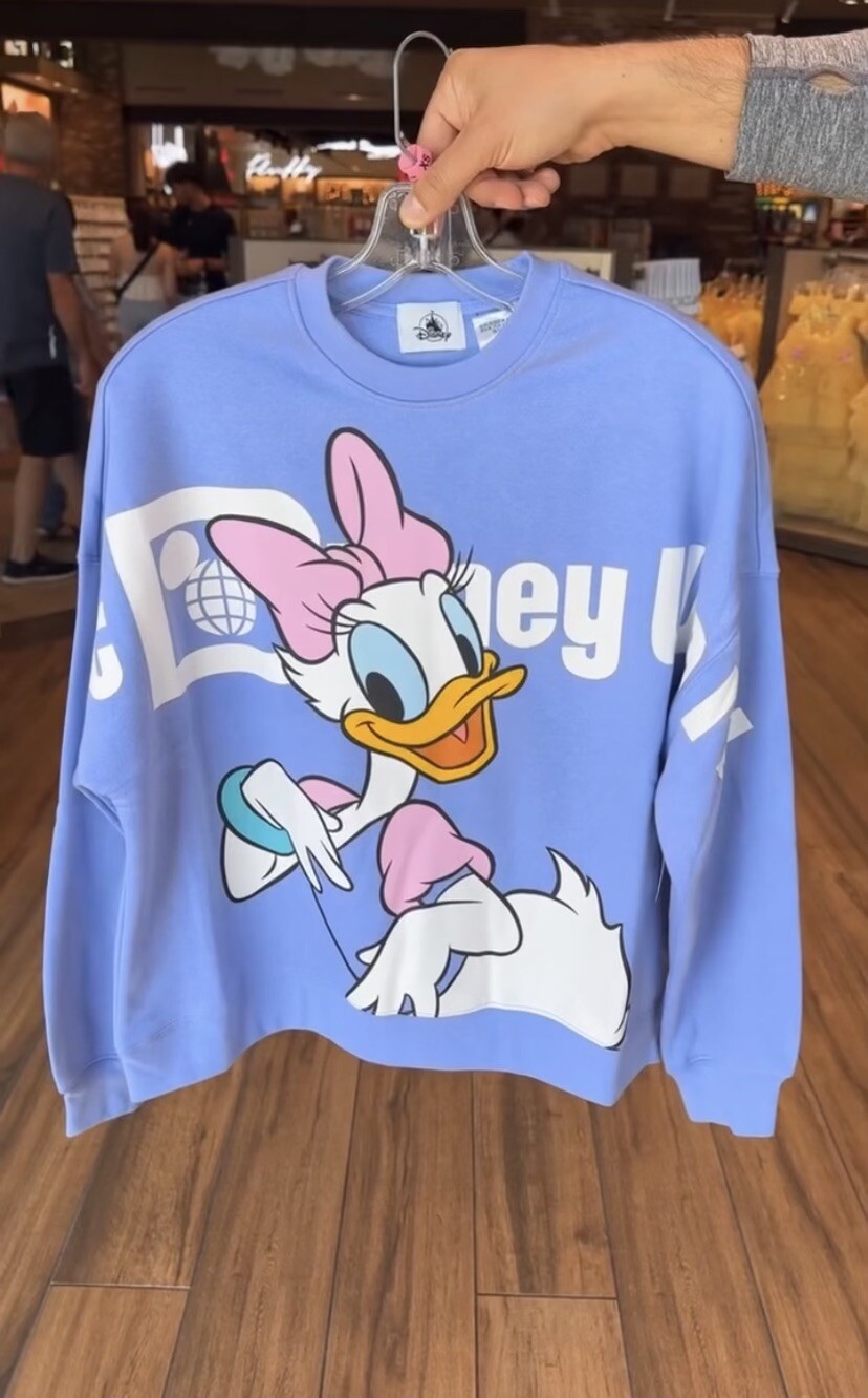 Suéter Pullover Cuello Redondo Pato Margarita Parques Disney 2024 Talla Pequeña