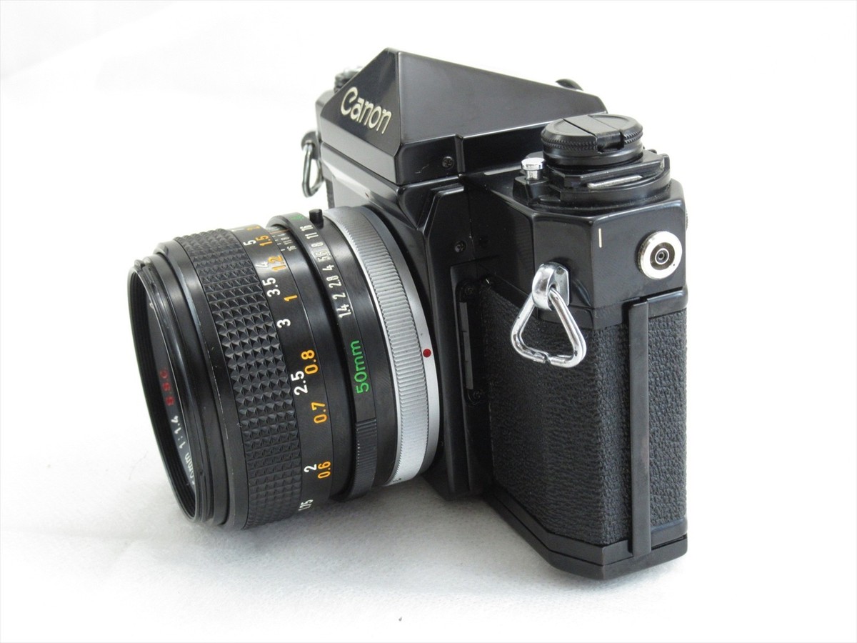 Canon AE-1 Black with FD 50mm f1.4 S.S.C. Lens And Power Winder