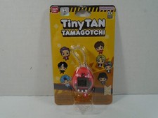 BANDAI--TINY TAN TAMAGOTCHI NEW RED