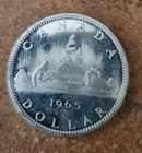 1965 uncirculated Canadian 80% silver dollar