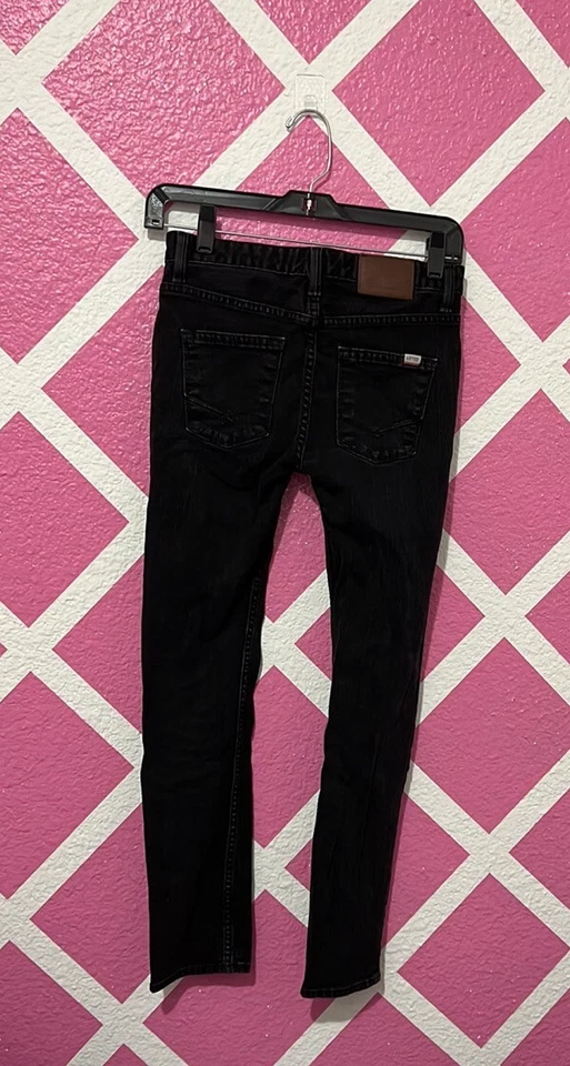 Vaqueros ajustados Vans para niños Foto 2 de 4