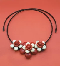 Red and white howlite 3 flower collar necklace 5" diam expandable.