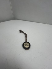 The Sak bag charm brown and gold