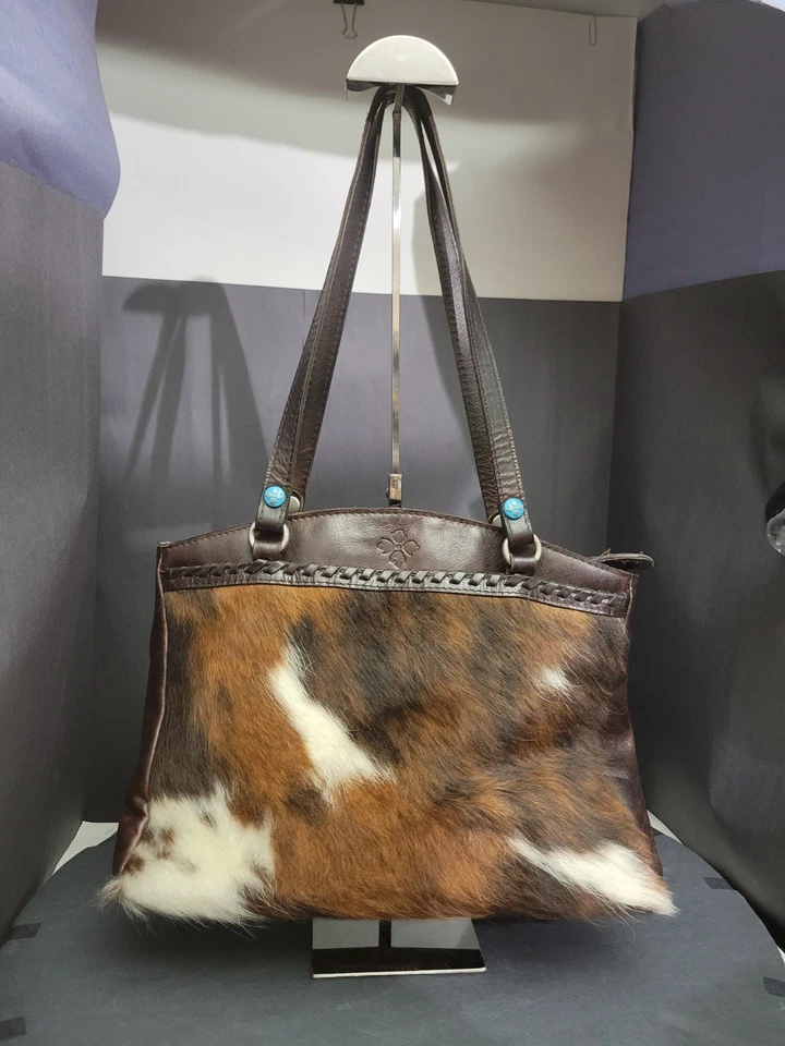 Cartera de Mano Patricia Nash de Cuero Italiano Pelo en Piel - Cuero de Vaca Marrón y Blanco Foto 2 de 4