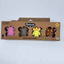 Fuggler Funny Ugly Monster Collectible Figures 4 Pack 6 Yrs.  Up 2.5  NEW 