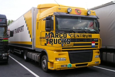 LKW Foto DAF XF Kofferauflieger Niederlande gelb CENTRUM DRIVEN BY LOGIST #b3oz