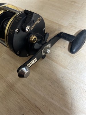 cheap sea fishing reels Quantum Merit 3000 Spinning Reel pricing Retrieve::Right/Left Vintage Fishing Lure Display dolphin and kingfish