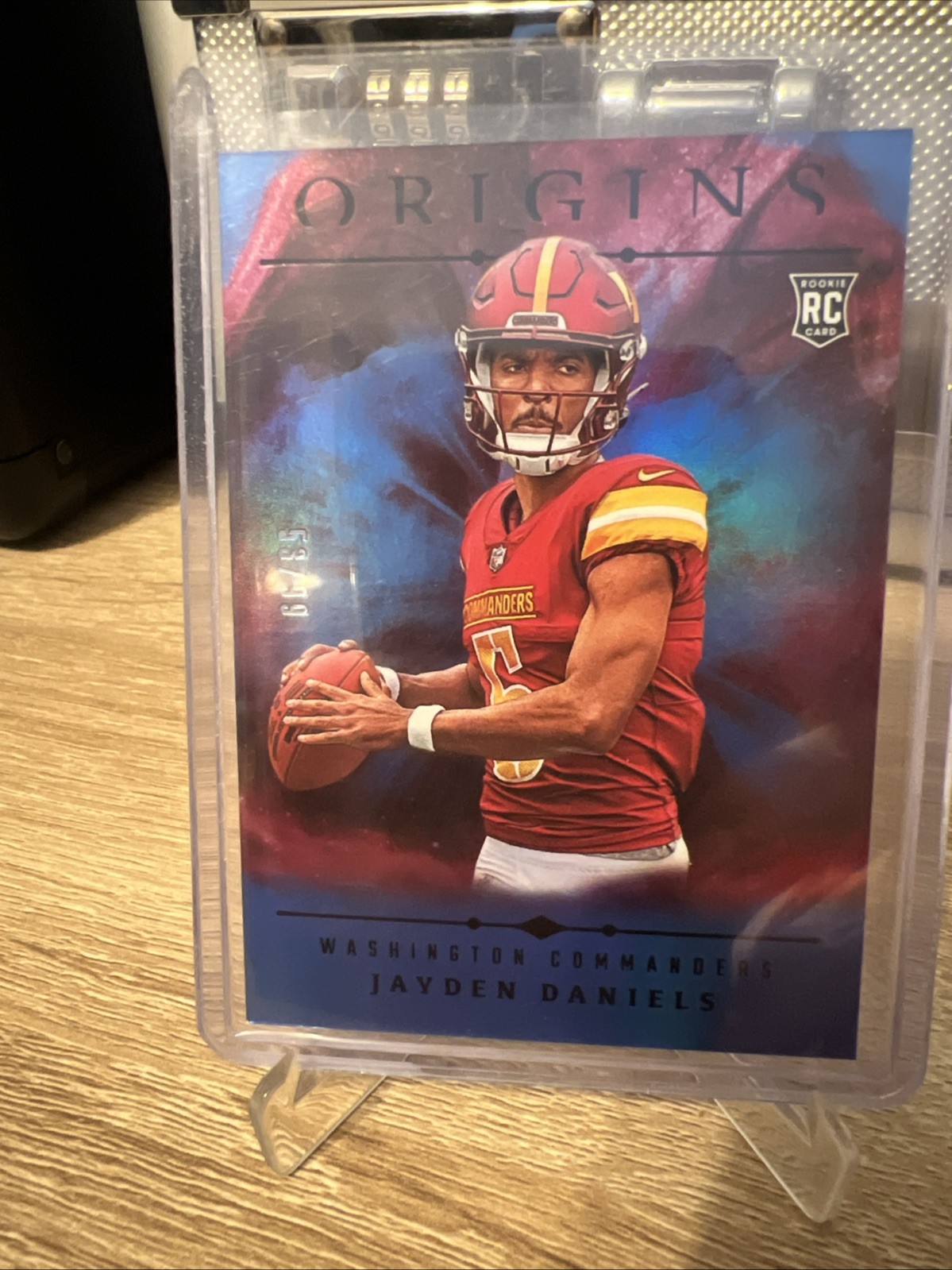 2024 Panini Origins - Rookies Jayden Daniels #144 Blue /99 (RC)