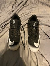 Black and white vapor cleats size 9.5 men