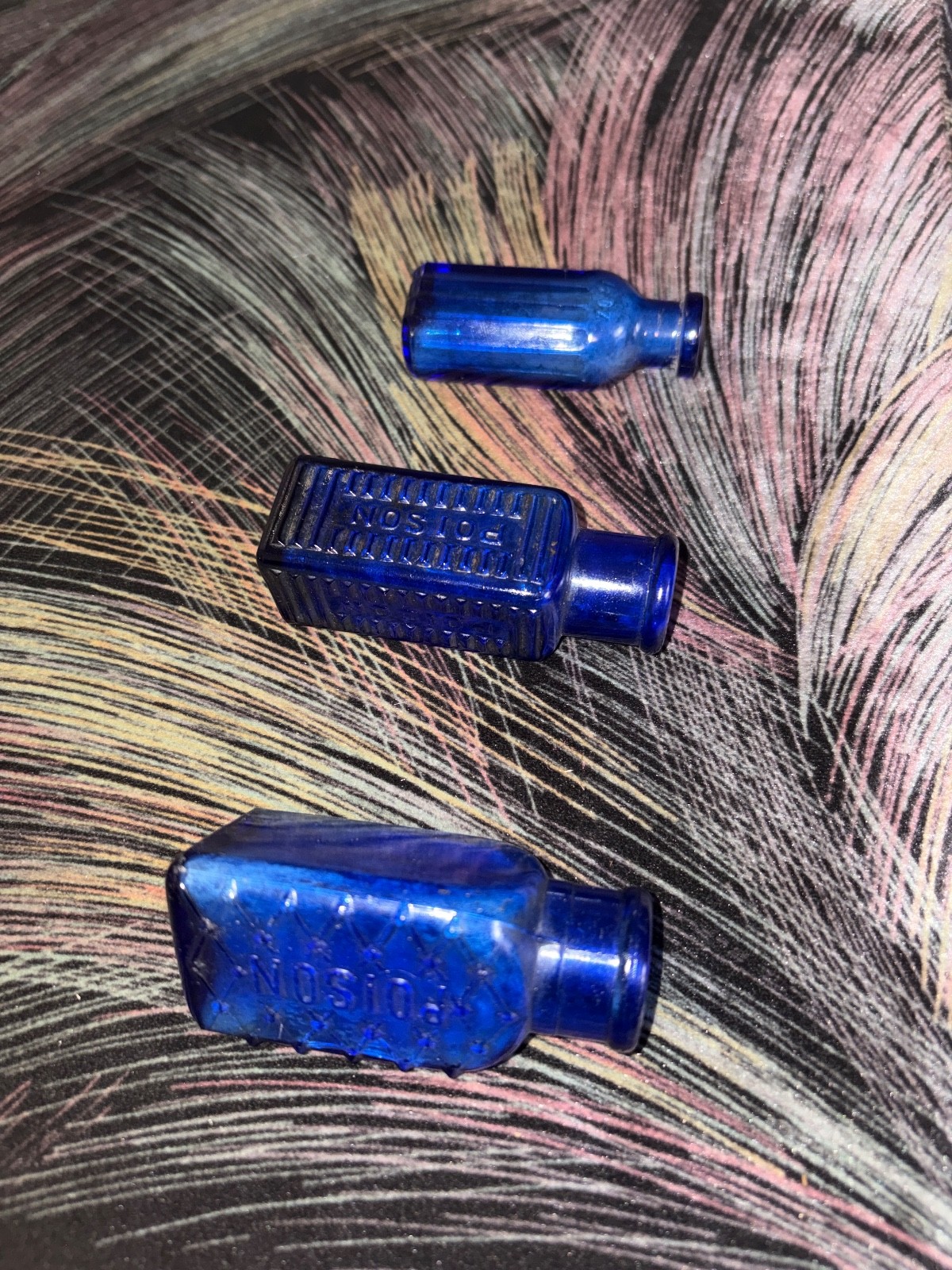 3 cobalt blue poison bottles. 2 etched. triangle. 1 ribbed etc ex con 1890s