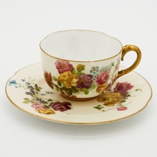 Antique Royal Worcester little cup and sauker...