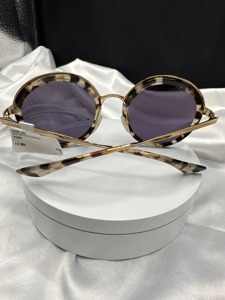 NUEVO CON ETIQUETAS PRADA redondo oro tortuga con lente púrpura. Etiqueta $400.SIN estuche.#DP2881201.Italia. Foto 3 de 4