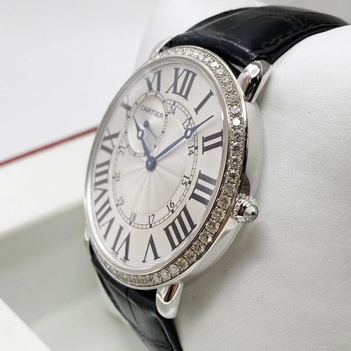 Montre Cartier ronde Louis 42 mm or blanc 18 carats lunette diamant cadran argenté WR007002 - Photo 4 sur 11