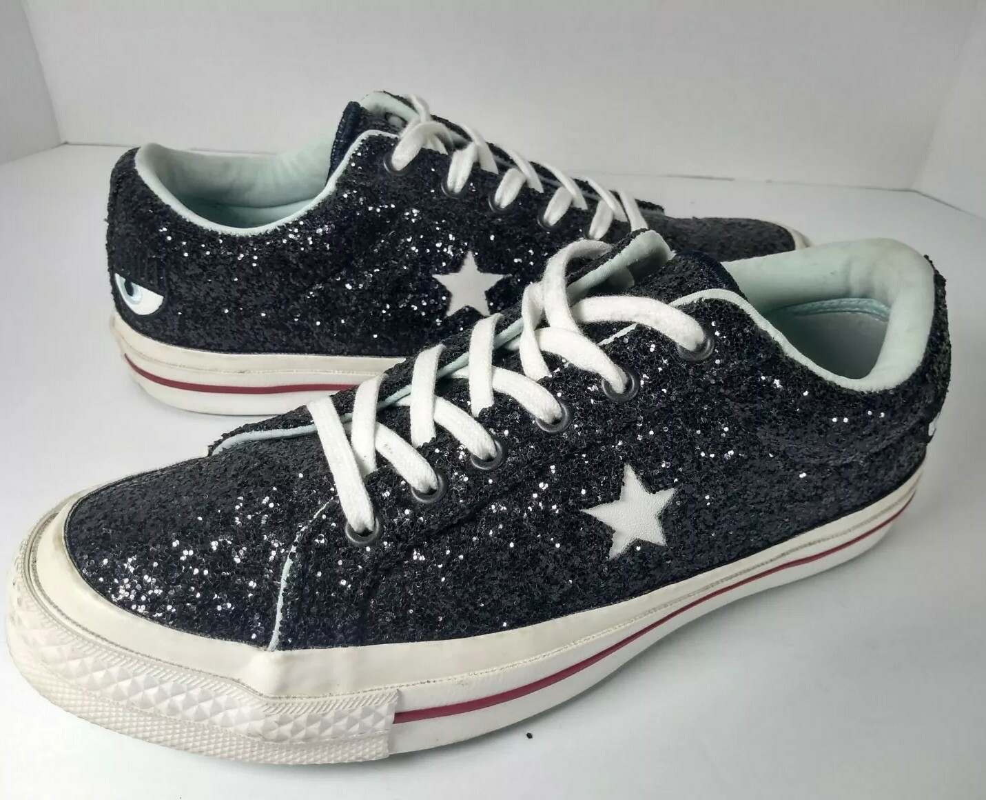 black glitter chuck taylors