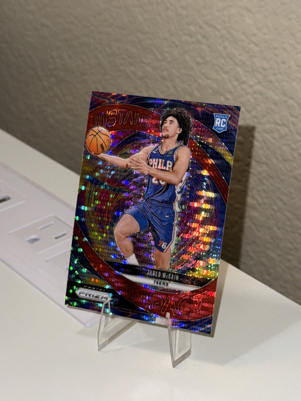 2024-25 Panini Prizm - Jared McCain Instant Impact Red Pulsar Prizm /75 (RC) #10
