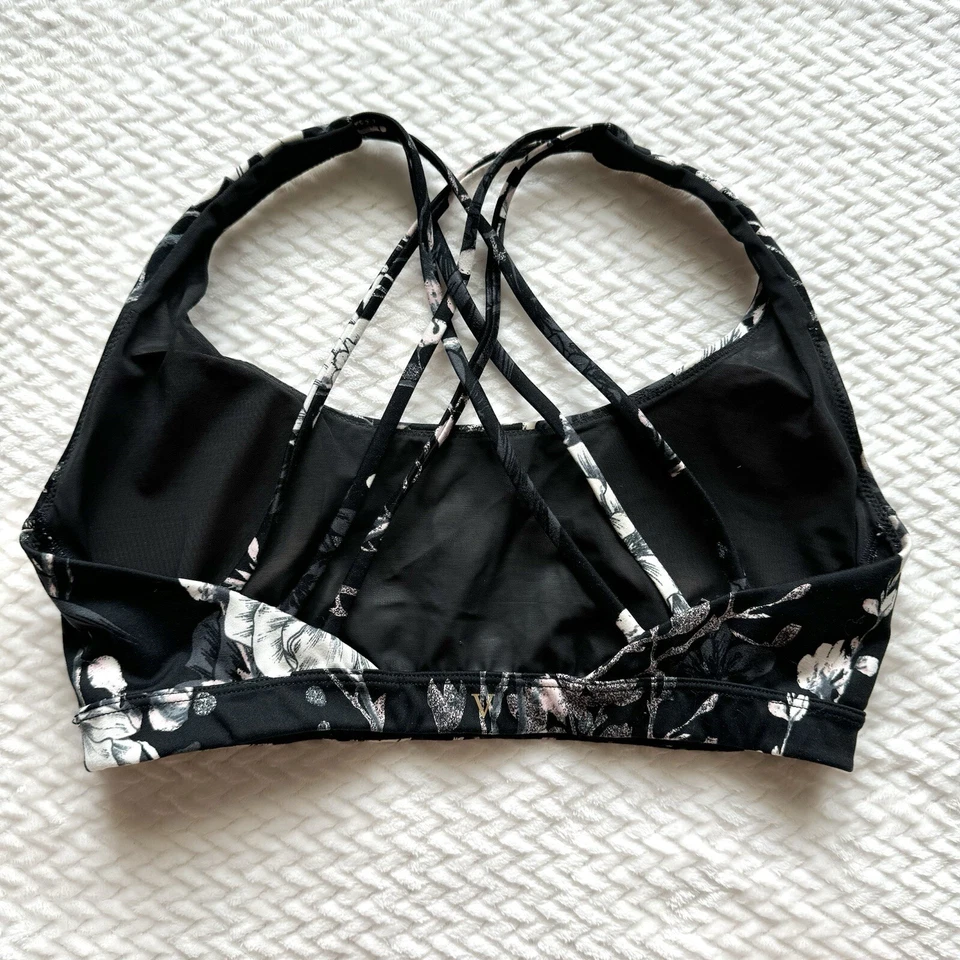 Sujetador deportivo Victoria’s Secret Incredible Essential con tiras en la espalda M floral oscuro Foto 3 de 4