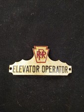 Antique Pennsylvania Railroad Elevator Operator Hat Badge