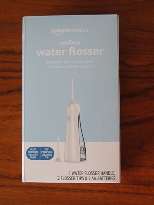 NEW Amazon Basics HydroClean Cordless Water Flosser, 2 Flosser Tips & Batteries