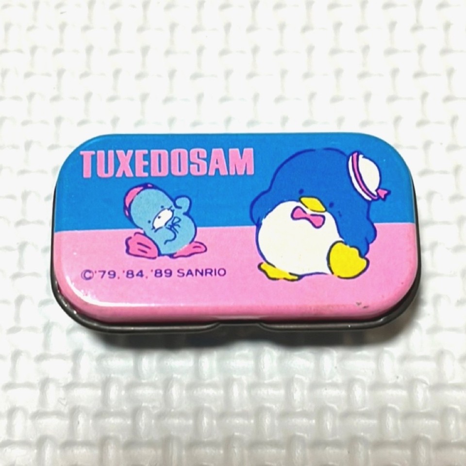 Unused vintage Sanrio Tuxedo Sam tin pencil case imported from Japan — a rare, charming 80s collectible that still looks pristine.