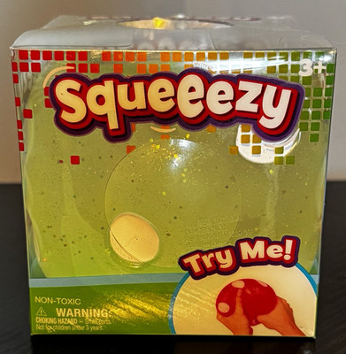 NEW Authentic Viral Squeeezy Dice Green Gliter Gel Squishy Squeeze Toy NIB
