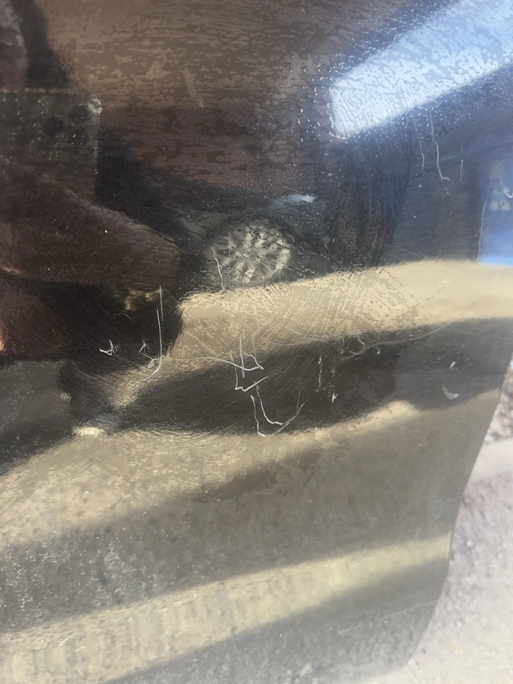 Puerta trasera para conductores Nissan Navara 2017 NP300 negra y plateada Foto 2 de 4