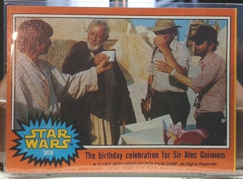 1977 Topps Star Wars #309 The birthday celebration for Sir Alec Guinness — Raw