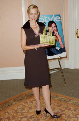 Julie Benz holding the handbag she donated at Lupus LA & InStyle M- Old Photo 1