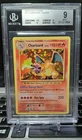 2016 POKEMON XY EVOLUTIONS #11 CHARIZARD-HOLO R BECKETT 9