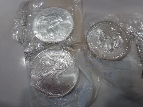 3  American Eagle Silver Dollar coins, Uncirculated, 1 oz .999 Fine silver