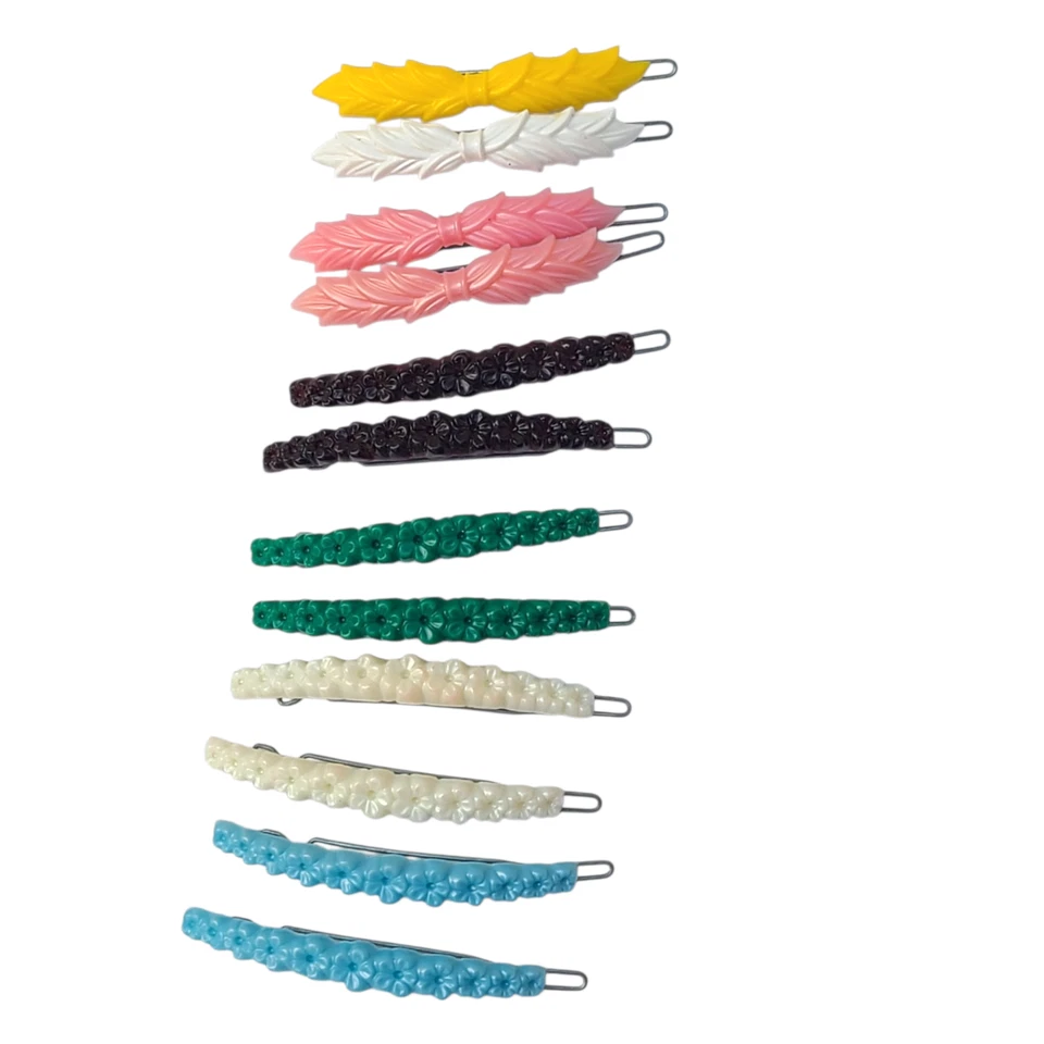 LOTE VINTAGE AÑOS 50 1960 PLÁSTICO CON PASADORES METÁLICOS AZUL ROSA NEGRO BLANCO VERDE Foto 2 de 4