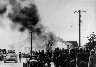 German invaders stand in foreground of an evacuated Russian villag- Old Photo