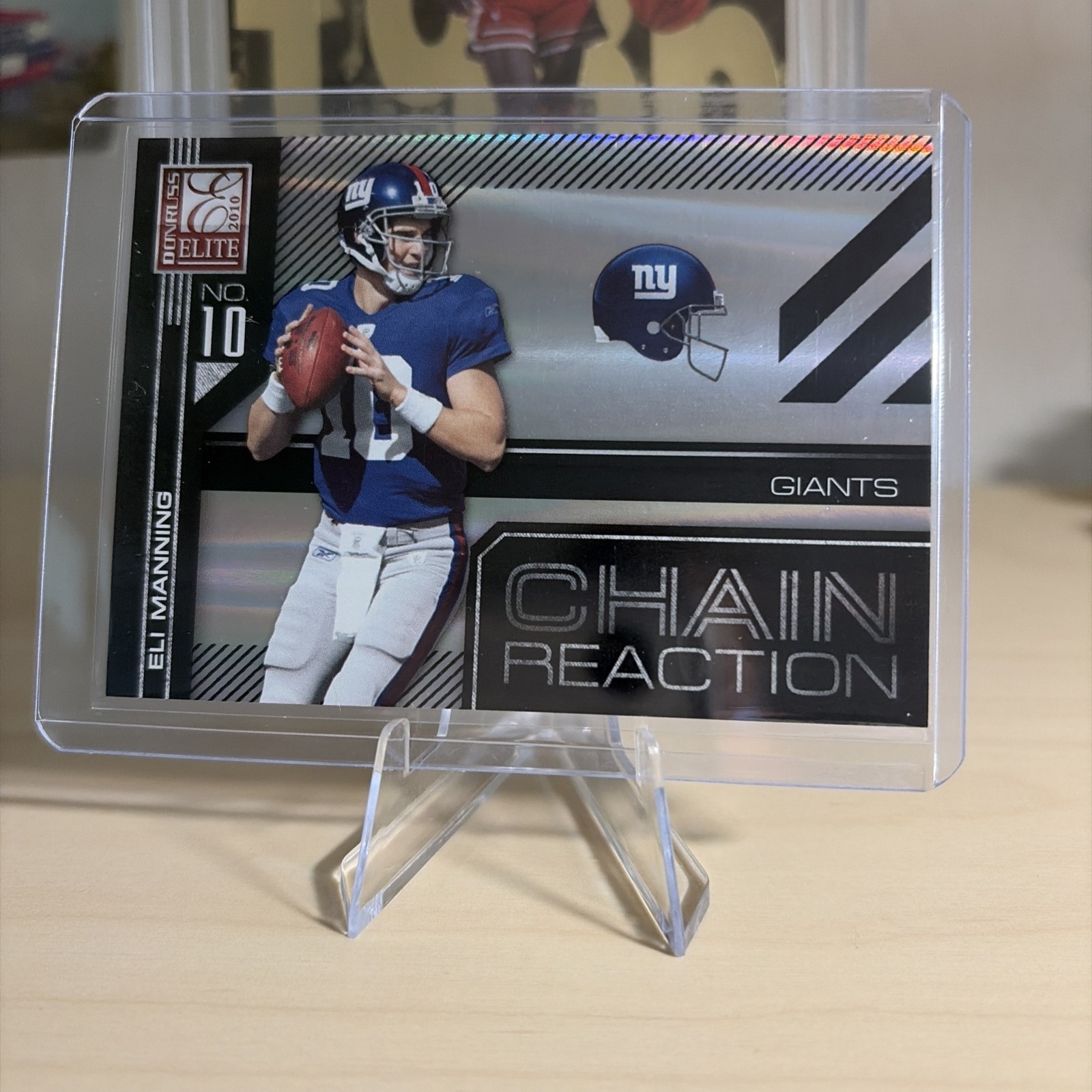 2010 Donruss Elite #13 Chain Reaction - Eli Manning /99