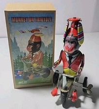 VINTAGE METAL WIND UP MONKEY ON TRIOYOLE  TRICYCLE  with original box ,key