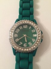 Ladies green face silicone band silvertone crystal watch needs new battery