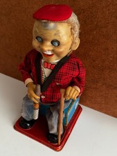 Vintage Rosko McGregor Smoking Grandpa. Tin Toy. In Working Order. 1960