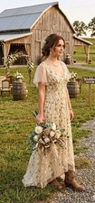 Long Gold Gown sequin dress size 2/4.With embroidered leaves. Tulle Sleeves