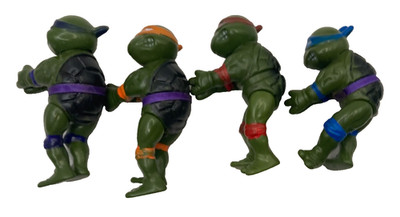 Vintage TMNT Clip On Stretch Figures Set Leonardo Raphael Donatello Michelangelo