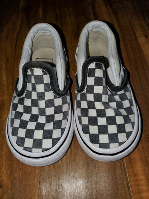 black and off white checkered vans