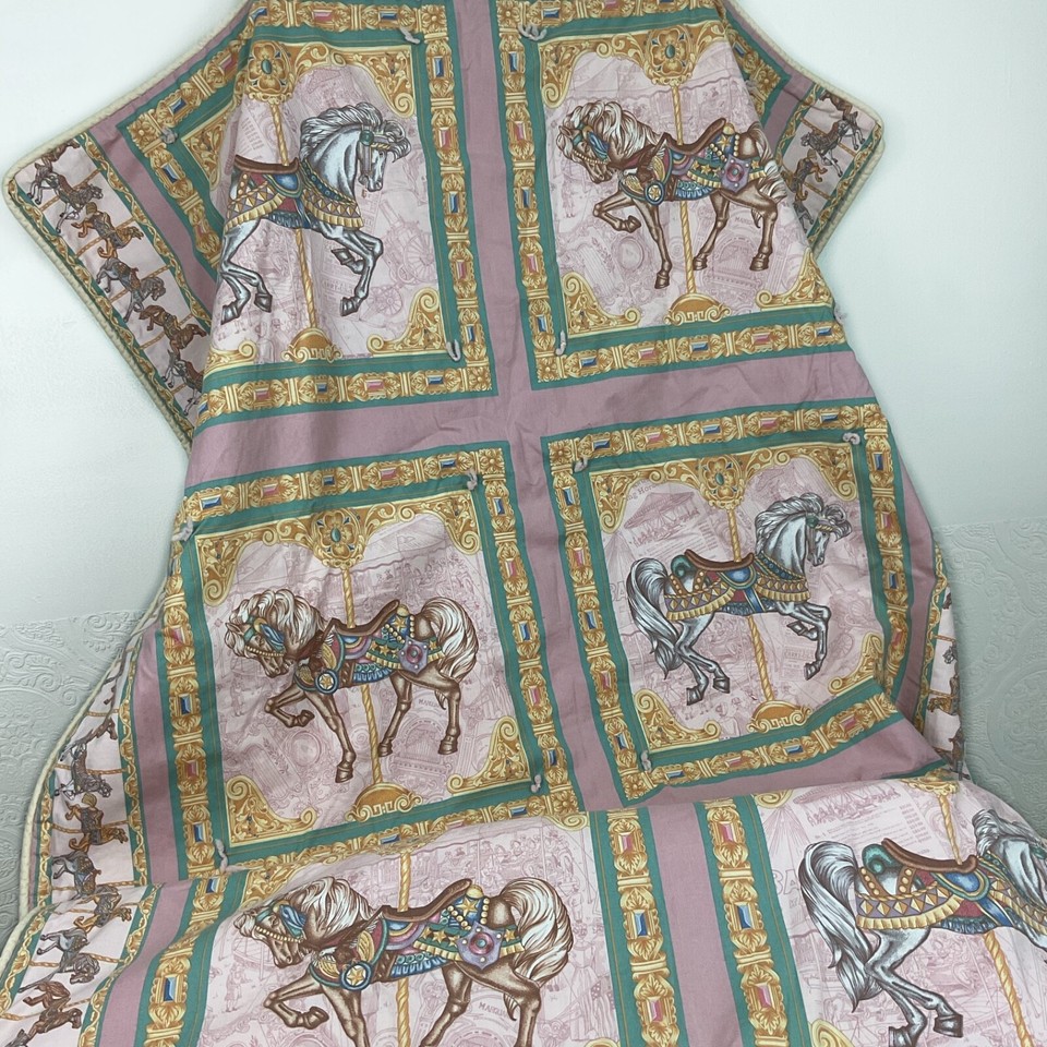 Handmade vintage carousel horse lap quilt — the kind of cozy, folk-art textile that looks like it came from a beloved grandmother's attic.